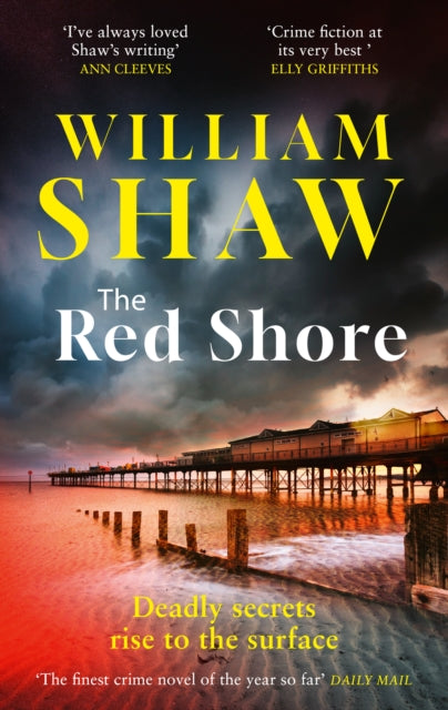 Book cover of 'The Red Shore' by William Shaw with a stormy sky and pier.