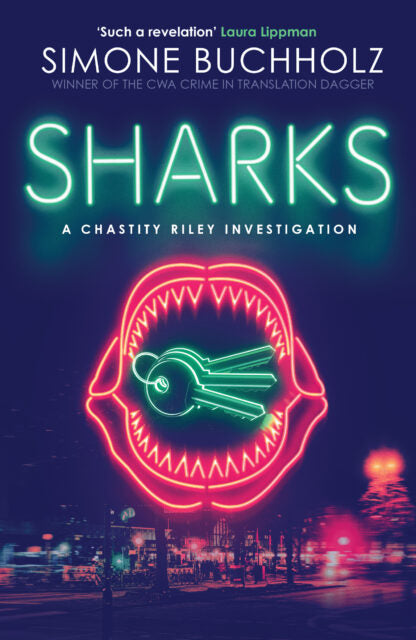 Book cover of 'Sharks' by Simone Buchholz with neon shark design and cityscape background.