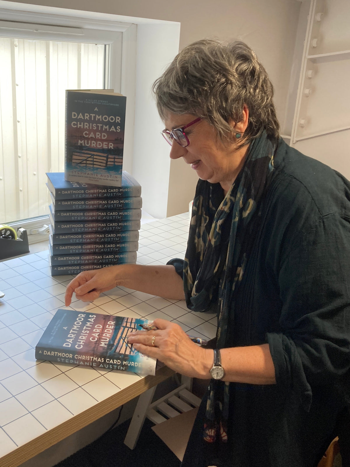 Stephanie Austin signing copies of A Dartmoor Christmas Card Murder for Gumshoe Books, 10th October 2026